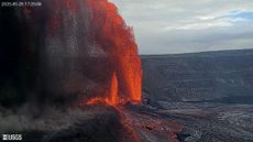 A photograph of Kilauea volcano erupting with a gigantic fountain of lava.