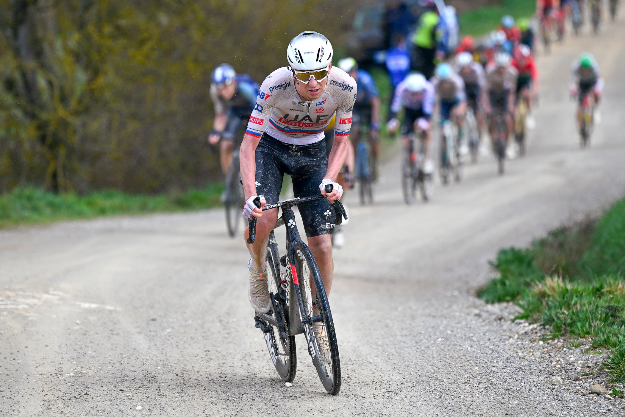 Tadej Poga&amp;#269;ar attacks his rivals uphill on the Monte Sante Marie gravel sector at the 2024 Strade Bianche to begin his 81km solo ride to victory