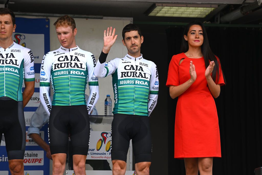 Mikel Nieve (Caja Rural) waves on stage during the team presentation