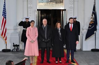 kamala harris stands with JD vance at the white house