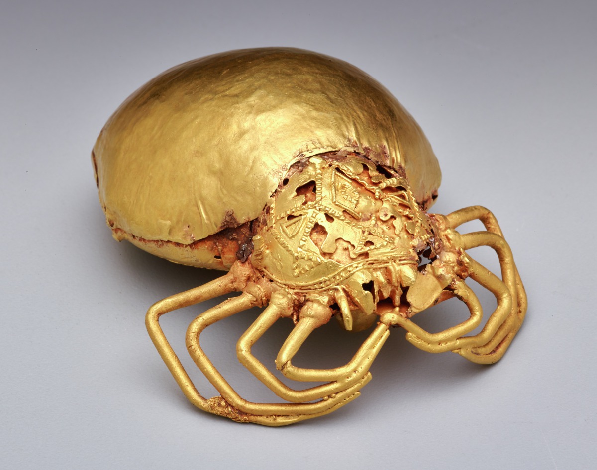 a spider cast from gold