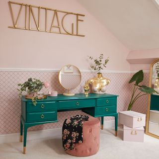 dressing room with pink wall and potted plant