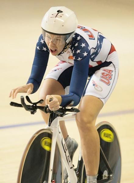 Sarah Hammer (USA) starts to celebrate as she realises she has won the gold medal in the women's 3,000m individual pursuit.