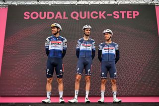 CAMAIORE ITALY MAY 17 LR Davide Ballerini of Italy Pieter Serry of Belgium and Ilan Van Wilder of Belgium and Team Soudal Quick Step prior to the 106th Giro dItalia 2023 Stage 11 a 219km stage from Camaiore to Tortona UCIWT on May 17 2023 in Camaiore Italy Photo by Stuart FranklinGetty Images