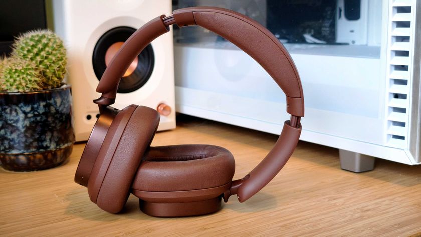 Brown Edifier ES850NB headphones on a desk