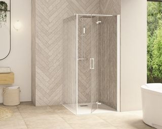 A shower enclosure with frosted glass in a modern bathroom