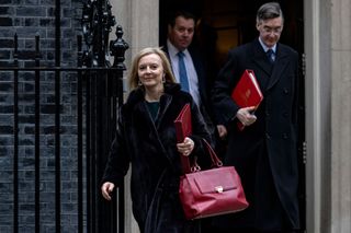 Foreign Secretary Liz Truss, Chief Whip Mark Spencer, and Leader of the House of Commons Jacob Rees-Mogg photographed leaving 10 Downing Street
