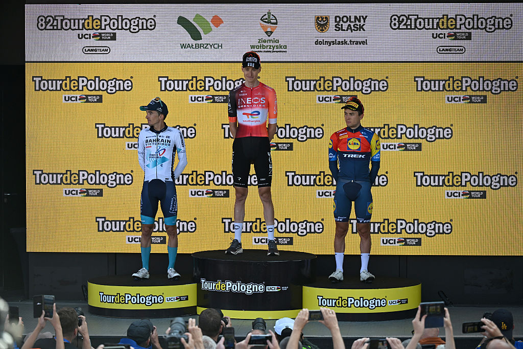 WALBRZYCH, POLAND - AUGUST 06: (L-R) Pello Bilbao of Spain and Team Bahrain - Victorious on second place, race winner Ben Turner of Great Britain and Team INEOS Grenadiers and Andrea Bagioli of Italy and Team Lidl - Trek on third place pose on the podium ceremony after the the 82nd Tour de Pologne 2025, Stage 3 a 159.3km stage from Walbrzych to Walbrzych / #UCIWT / on August 06, 2025 in Walbrzych, Poland. (Photo by Luc Claessen/Getty Images)