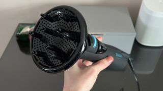 The Revamp Progloss Airstyle 6-in-1Air Styler DR-1250 with the diffuser attachment connected