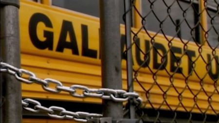 In the documentary Deaf President Now!, a Gallaudet University bus is shown behind a locked gate, as students shut down the school during the 1988 protest.