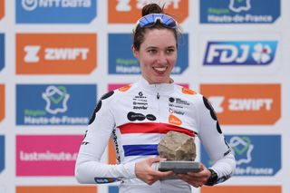 Pfeiffer Georgi (DSM-Firmenich PostNL) celebrates third place at the 2024 Paris-Roubaix Femmes