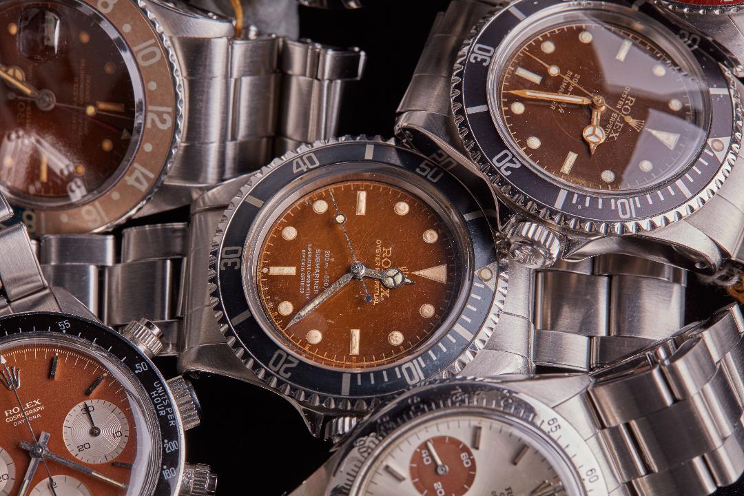 brown zenith and tudor watches