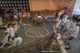 At the "Martian rock garden," a replica of InSight's landing site at NASA's Jet Propulsion Laboratory in Pasadena, California, engineers sculpt the Martian terrain to create an exact replica of InSight's surroundings on Mars.