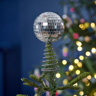Christmas tree topper made to look like a disco ball