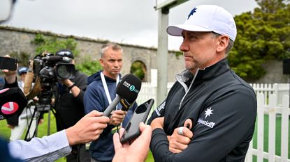 Ian Poulter speaks to journalists