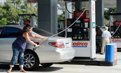 Californians pump gas: A drop in gas prices eased some of the strain on household budgets in November.