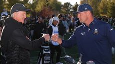 Greg Norman and Bryson DeChambeau give each other a fist pump during match-up event between LIV Golf and PGA Tour