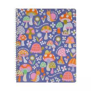 Blue spiral notebook with mushroom design
