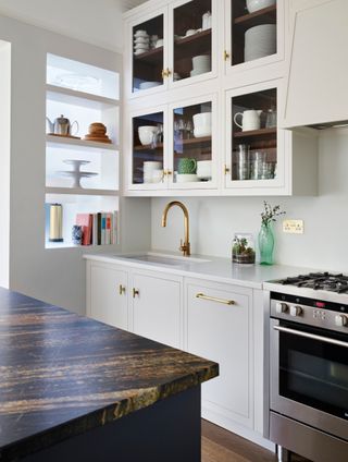 White kitchen with black oven