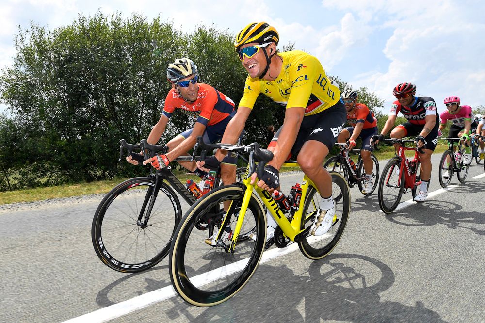 Greg Van Avermaet and vincenzo Nibali share a laugh during stage 7 at the Tour de France