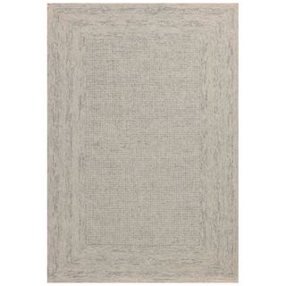 A beige and grey beige rug