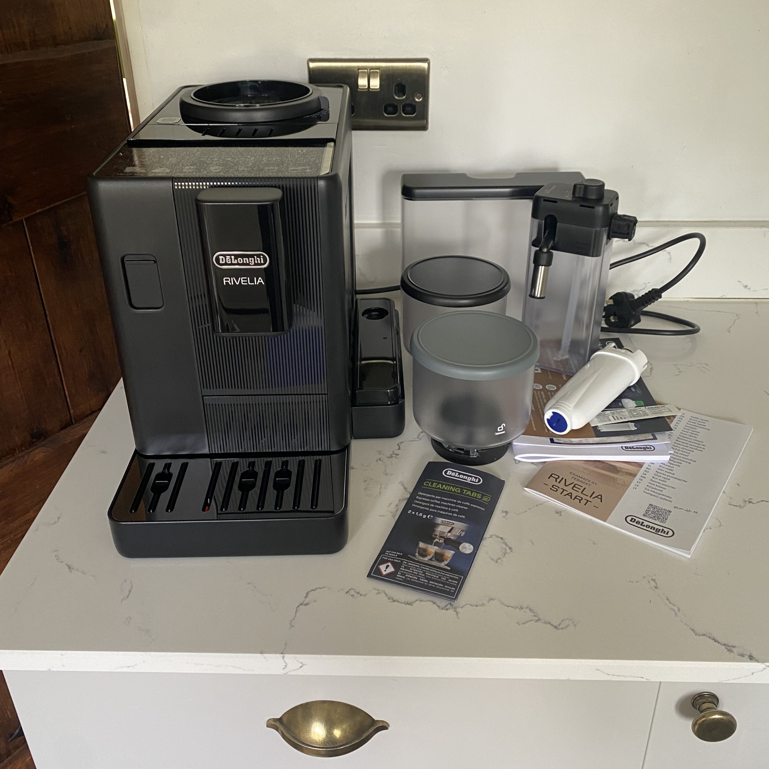 Unboxed items from De'Longhi Rivelia Start coffee machine