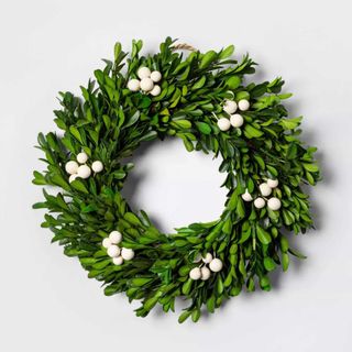boxwood wreath with white berries