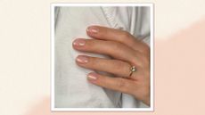 A close up of a hand with subtle French tip nails by nail artist @gel.bymegan/ in a cream and beige gradient template