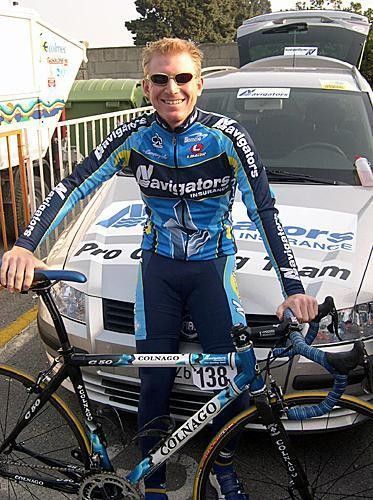 A boy and his dog - Phil Zajicek is happy as a clam with his new Team Navigators Colnago C50.