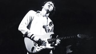 Mark Knopfler performing with Dire Straits in 1978