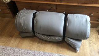 The Maxyoyo Japanese Floor Mattress rolled up