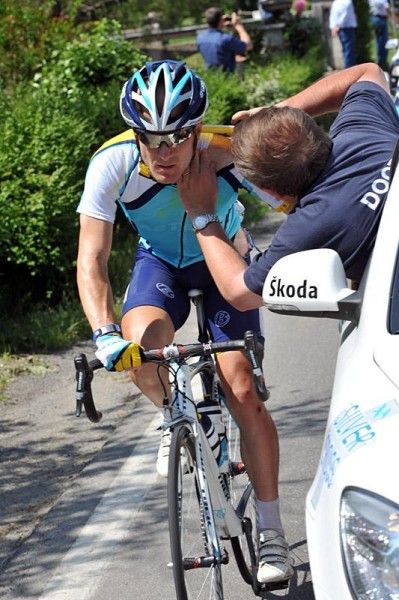 Levi Leipheimer is examined by the race doctor following his crash in stage 11.