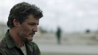 Joel (Pedro Pascal) looking sad in his green shirt in The Last Of Us episode 5