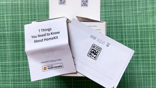 HomeKit code examples shown on accessory packaging and manuals