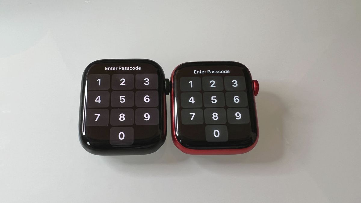 An Apple Watch 7 (45mm) on the left and an Apple Watch 6 (44mm) on the right