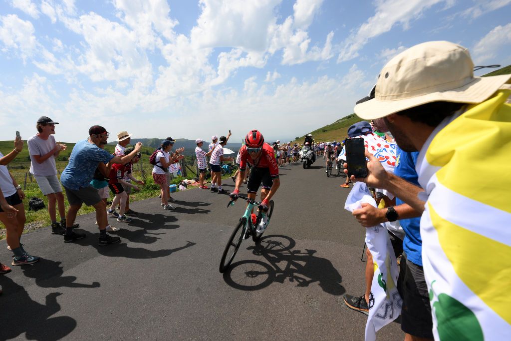 ISSOIRE FRANCE JULY 11 Warren Barguil of France and Team ArkaSamsic competes climbing to the Col de la Croix SaintRobert 1451m compete while fans cheers during the stage ten of the 110th Tour de France 2023 a 1672km stage from Vulcania to Issoire UCIWT on July 11 2023 in Issoire France Photo by David RamosGetty Images