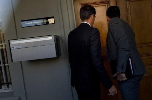 Behind this door lies Alberto Contador's future.