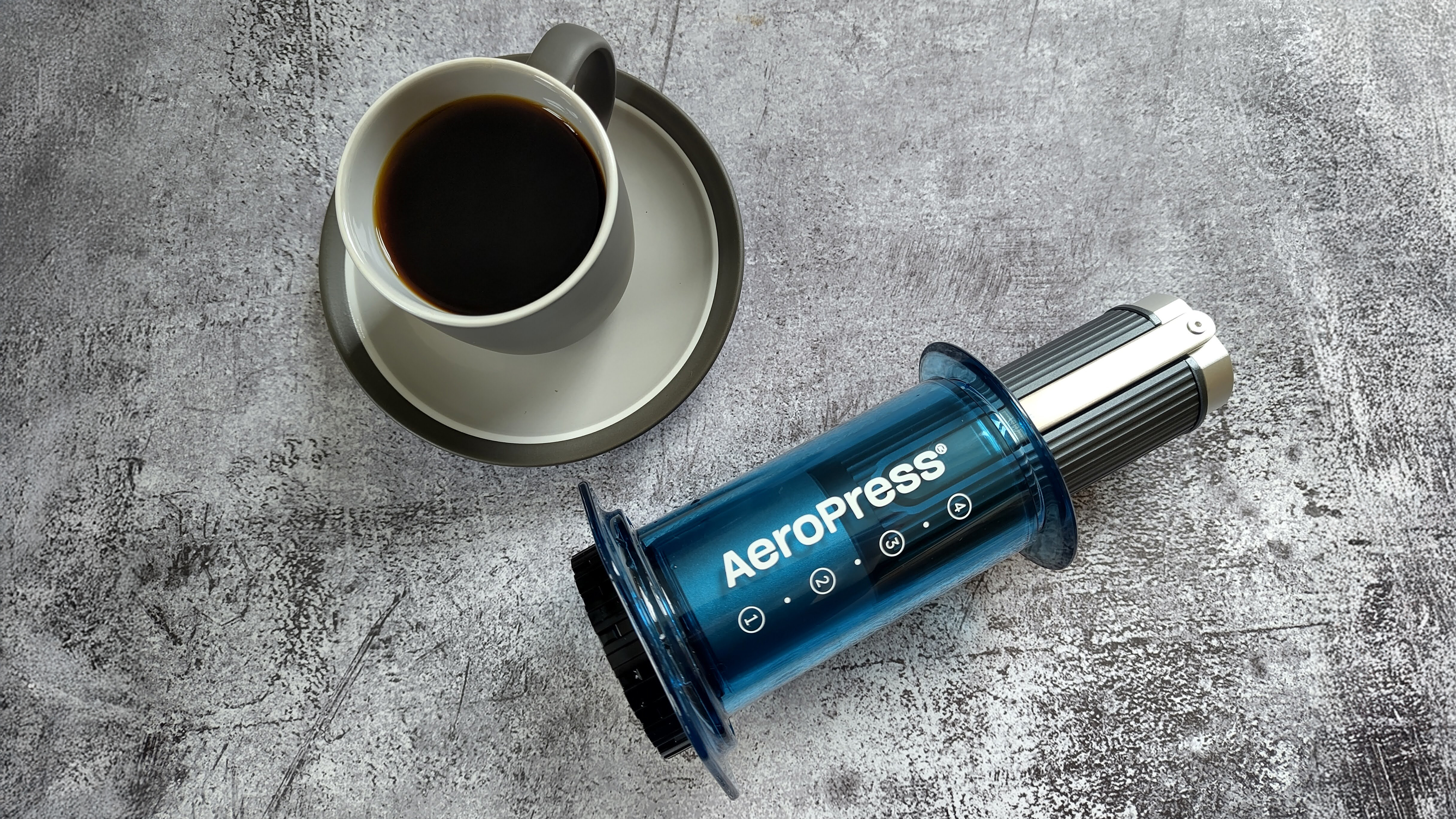 Aeropress manual coffee grinder inside AeroPress coffee maker