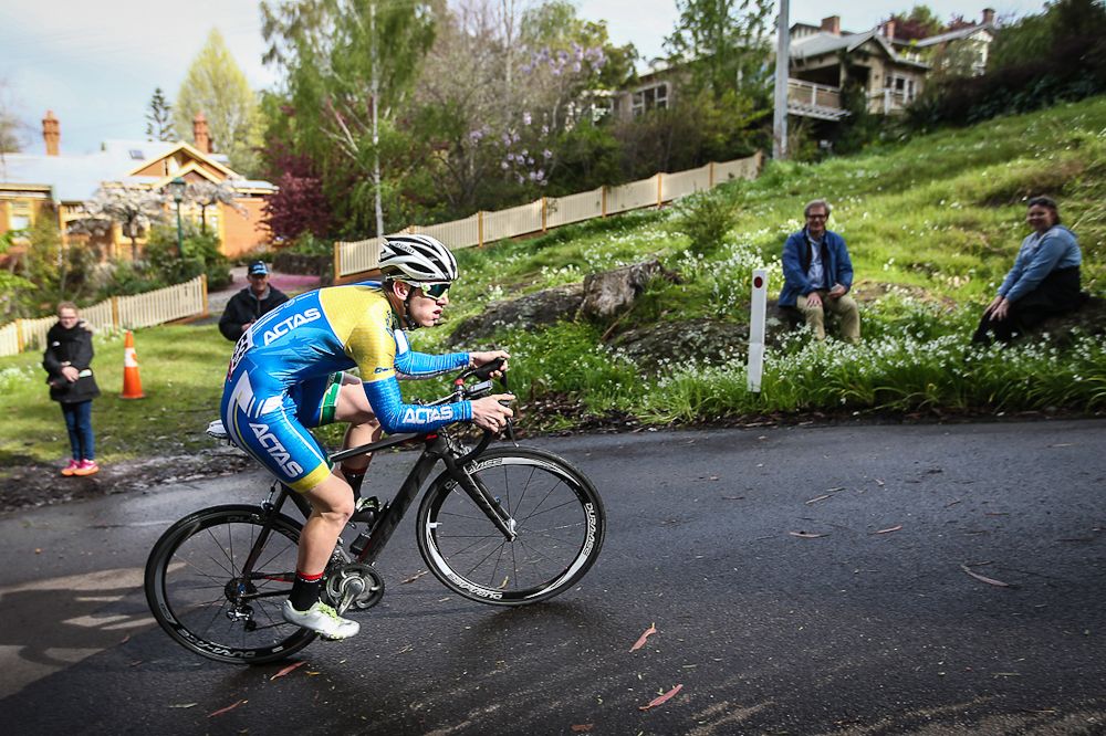 Spectators watch a rider during the Tour od Tasmania prologue