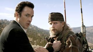 2012 - John Cusackâ€™s Jackson Curtis learns about impending disaster from Woody Harrelsonâ€™s flaky Charlie Frost in Roland Emmerichâ€™s blockbuster movie