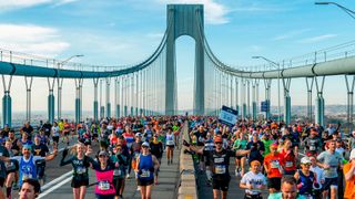 Runners cross the Verrazzano-Narrows Bridge at the start of the 2021 TCS New York City Marathon