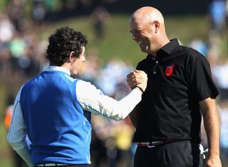 Stewart Cink (right) shakes hands with Rory McIlroy (left) at the 2010 Ryder Cup at The Celtic Manor.