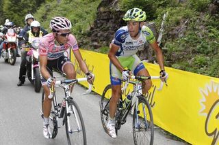 Vincenzo Nibali (Liquigas-Cannondale) looks across at an impassive Alberto Contador (Saxo Bank-SunGard) on the slopes of the Zoncolan.