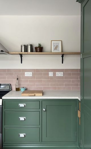 Green and pink small kitchen with open shelving