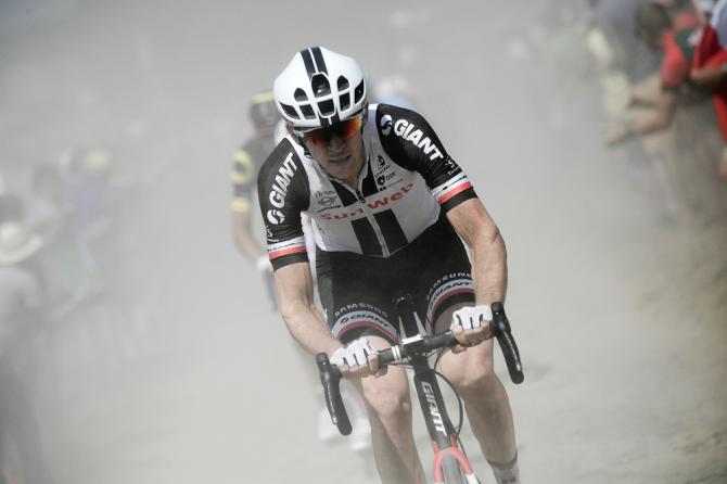 Chad Haga rides through the dust and over the cobbles during stage 9 at the Tour de France