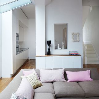 Living room with white walls and streamlined furniture