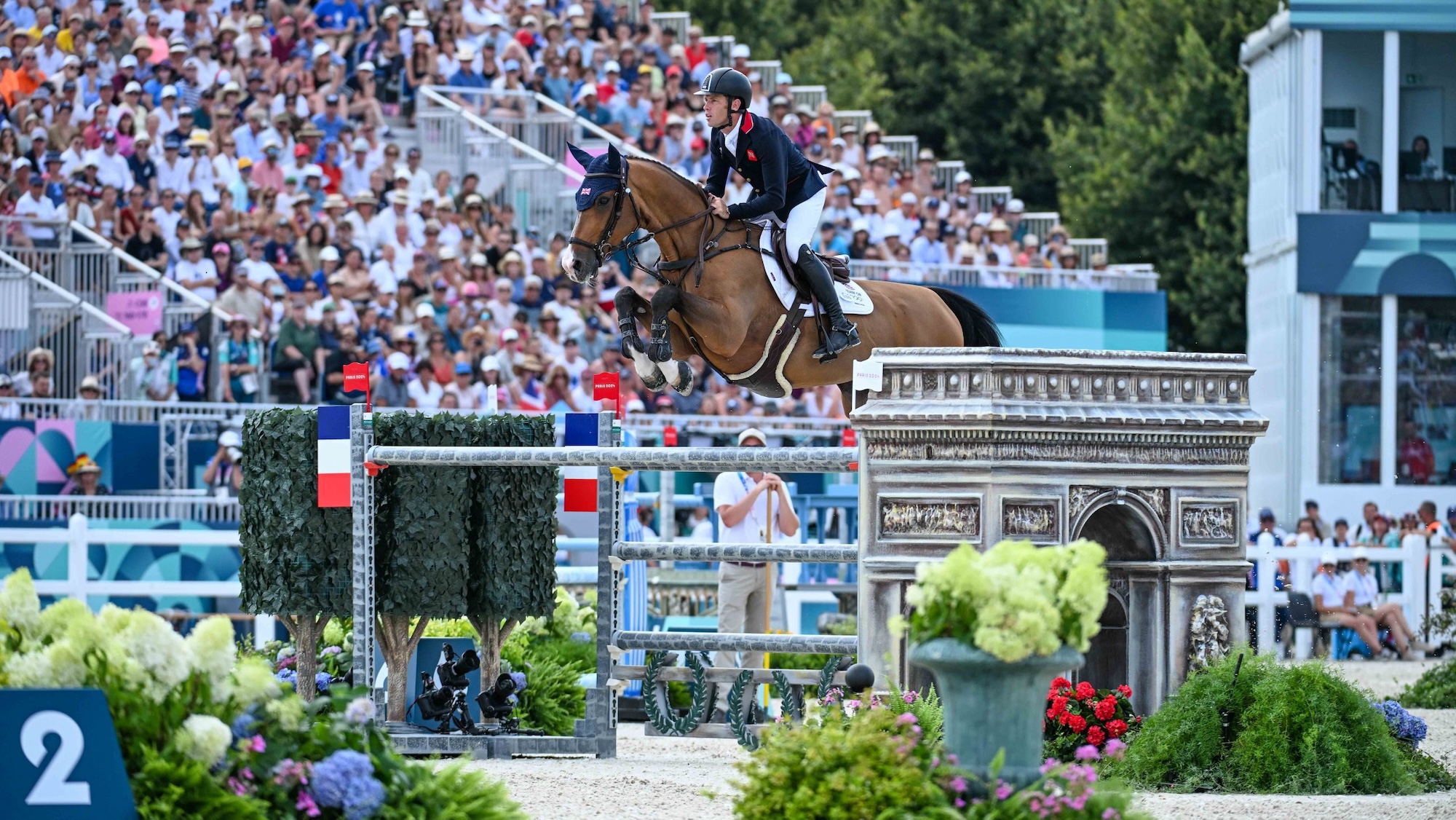 Scott Brash and Hello Jefferson jump a fence at the Paris Olympics