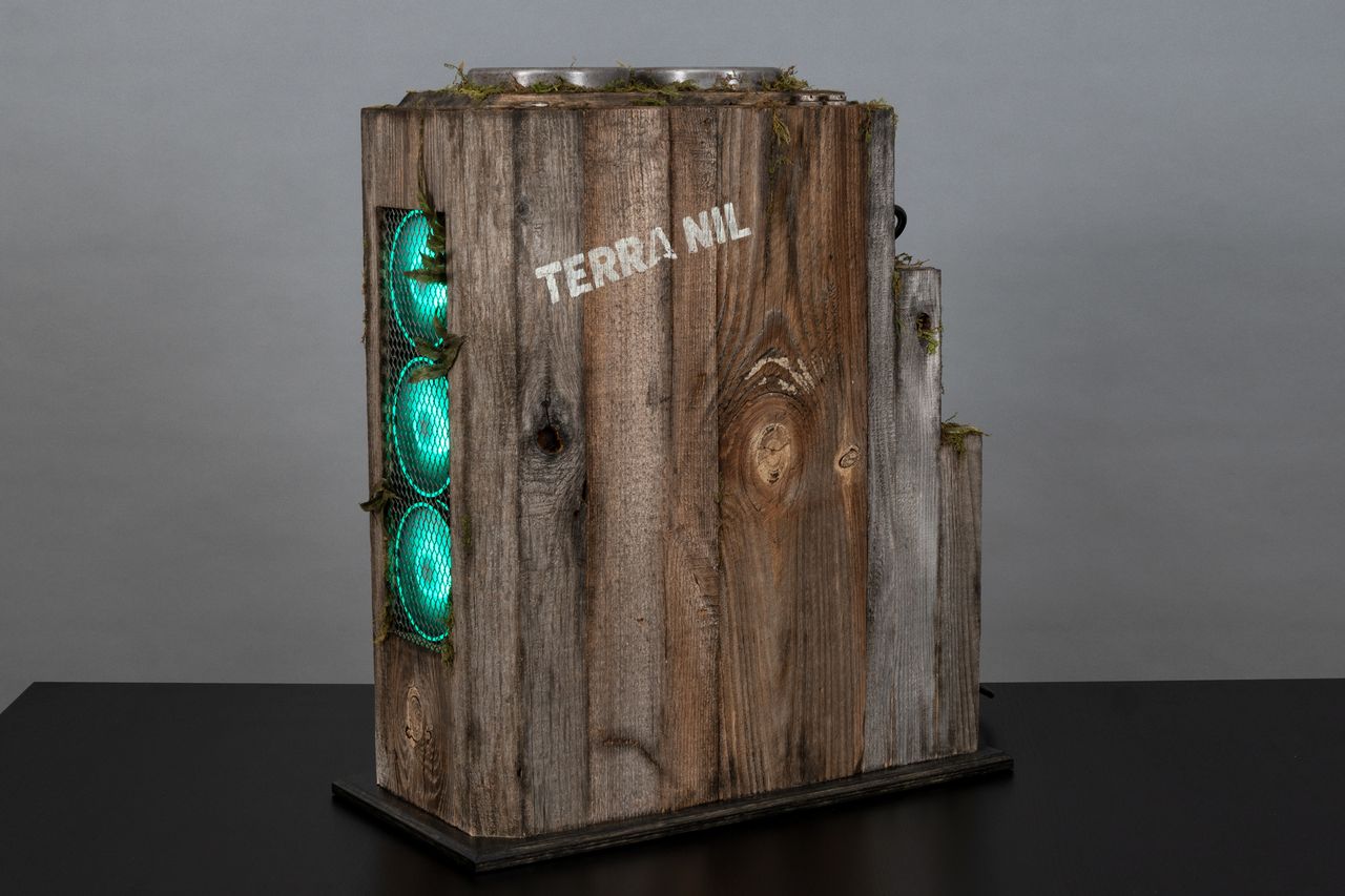 The Terra Nil custom gaming PC side on.