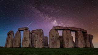 An photo of the Milky Way behind Stonehenge
