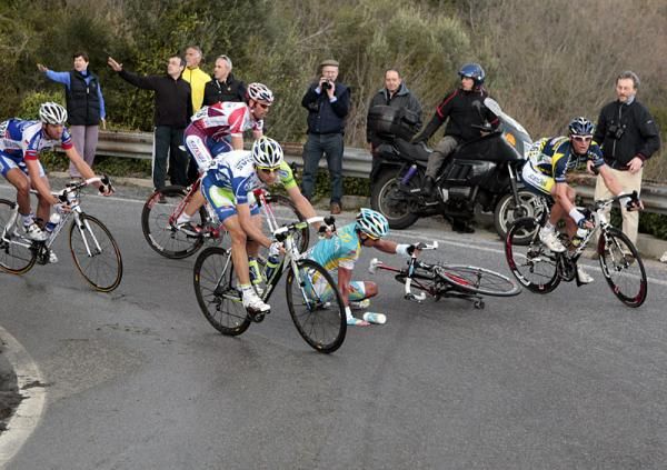 Allan Davis (Astana) crashes on a slick turn.